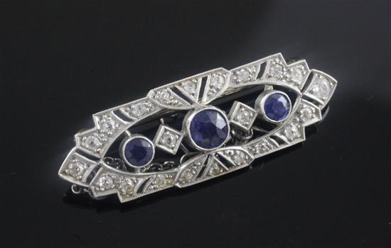 An Edwardian gold and silver, sapphire and diamond set openwork brooch, 1.5in.
